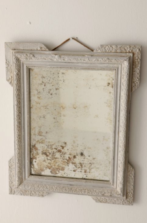 this mirror is lovely... the frame unusual, the mirror itself... spectacular.<br />
<br />
photos john granen