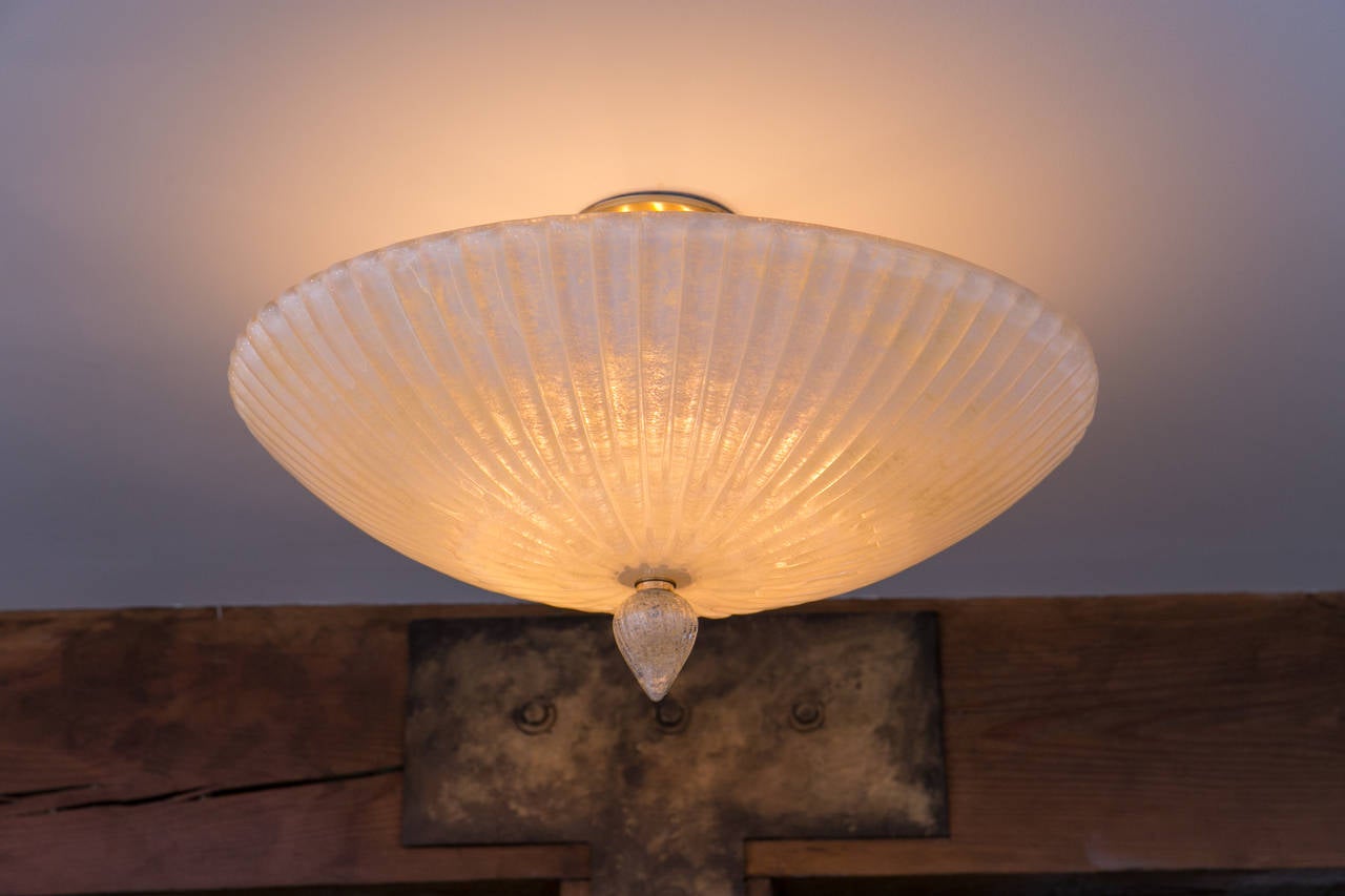 Elegant Murano blown parchment color reeded ceiling fixture with toupie finial.
Also available in white 
Can be made install ready to code or UL certification and  to desired drop or as a near flush mount