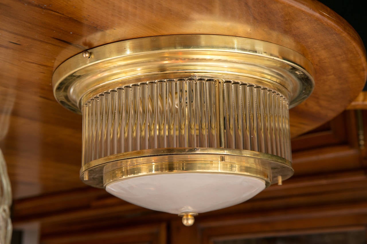 Elegant flush mount in blown glass and brass from Venini's, 1940s Hotel collection. This light is the smaller size available in the straw model.
Each light is stamped with Venini's mark.
Two available.