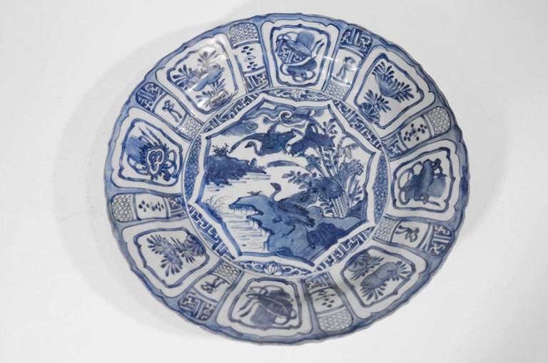 A large Ming Blue and White charger showing the traditional 