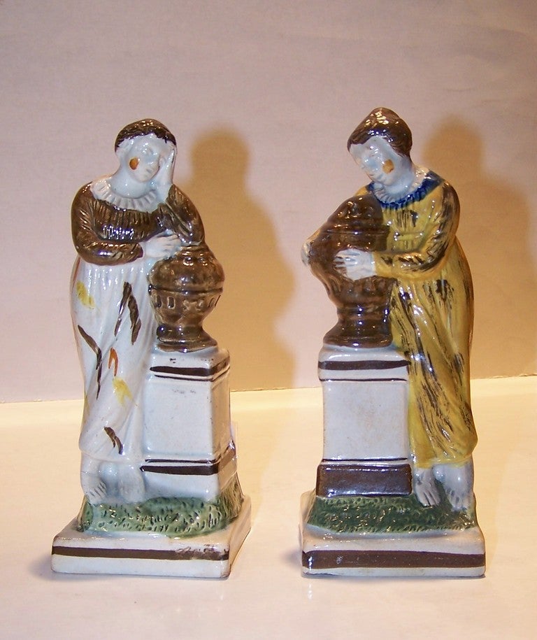 A pair of dramatic Prattware mourning figures possibly 