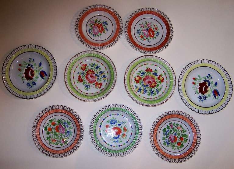A Group of 9 Arcaded Creamware Plates in Bright Colors