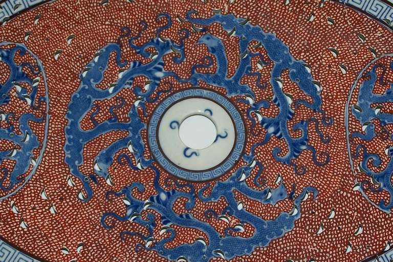Antique Pierced Oval Red white and Blue with Greek Key Border and Dragons