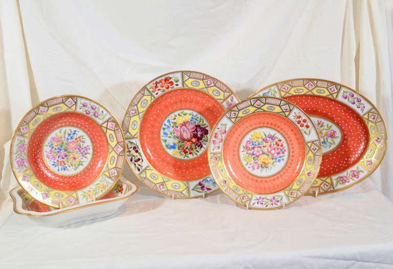 A group of dishes in the remarkable Coalport Church Gresley pattern with striking yellow borders and bold orange ground filled with gold stars.  A beautifully painted floral center completes the design.
Church Gresley is one of the most memorable