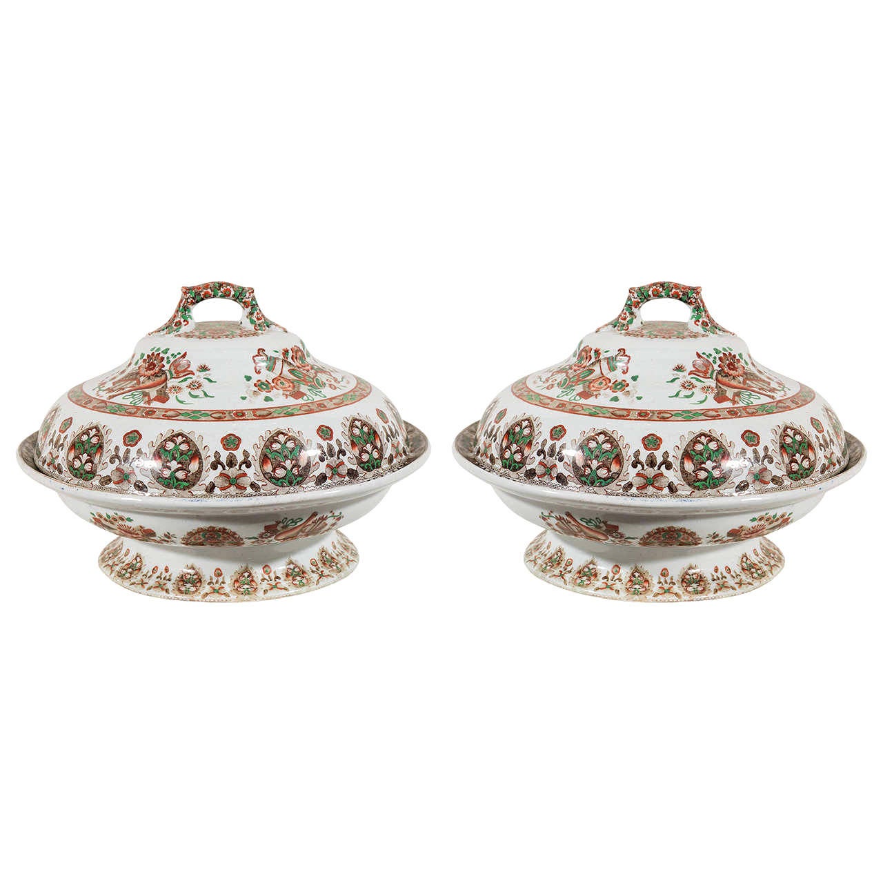 We are pleased to offer this pair of English porcelain tureens painted with a striking chinoiserie decoration. They were made by Copeland Spode circa 1840. The decoration on these tureens is a combination of medallions, flowers and auspicious