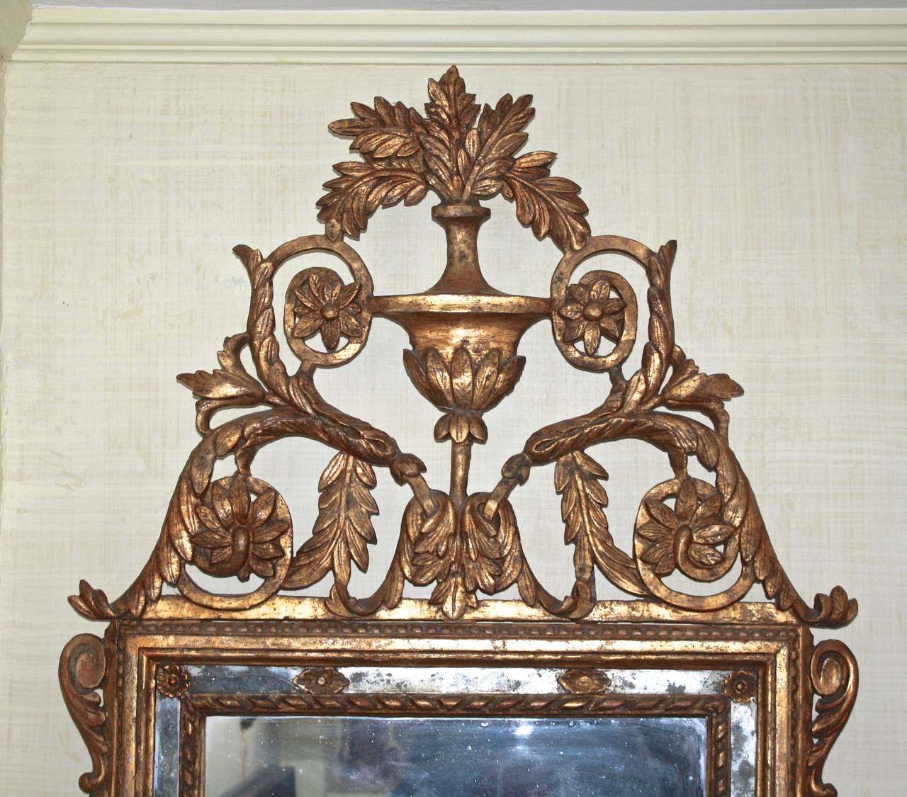 Italian antiques of Piedmontese origin are prized by knowledgeable collectors
for their scarcity. This specimen mirror appears to be fully original and 'as made' in the last quarter of the 18th century, right down to its backboards;
with the sole