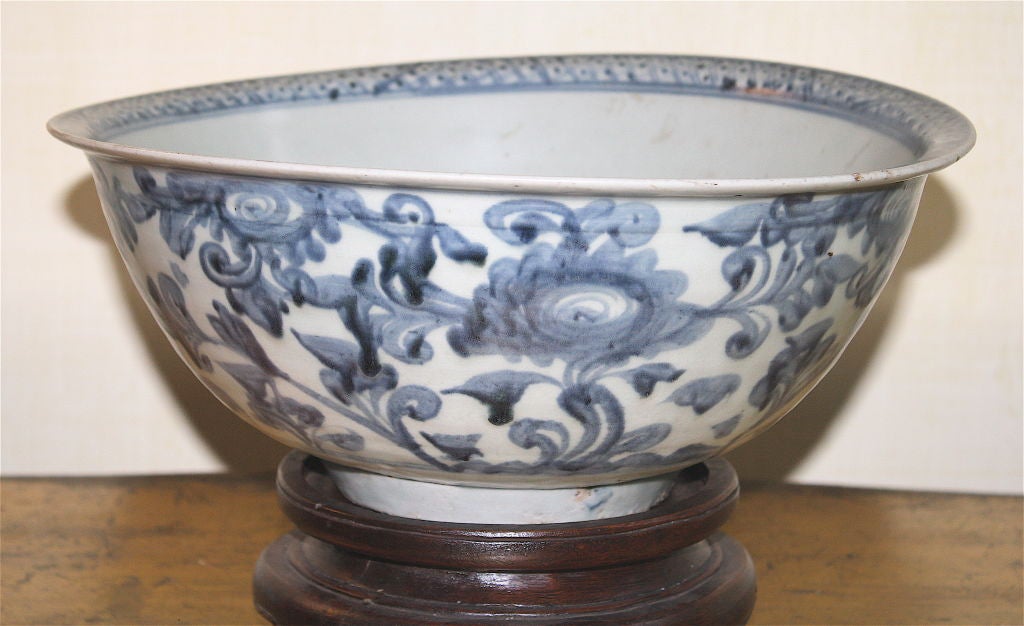 In the manner of a 15th century Ming Dynasty Yongle period provincial (non-Imperial) large bowl;  likely made for export to other Far Eastern countries. Unmarked; mid 18th century dating from the Qing Dynasty/Qianlong period (1736-95).