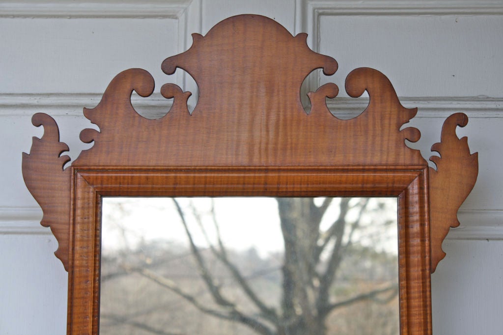An American Chippendale tiger maple wall mirror, made in the manner of American 
