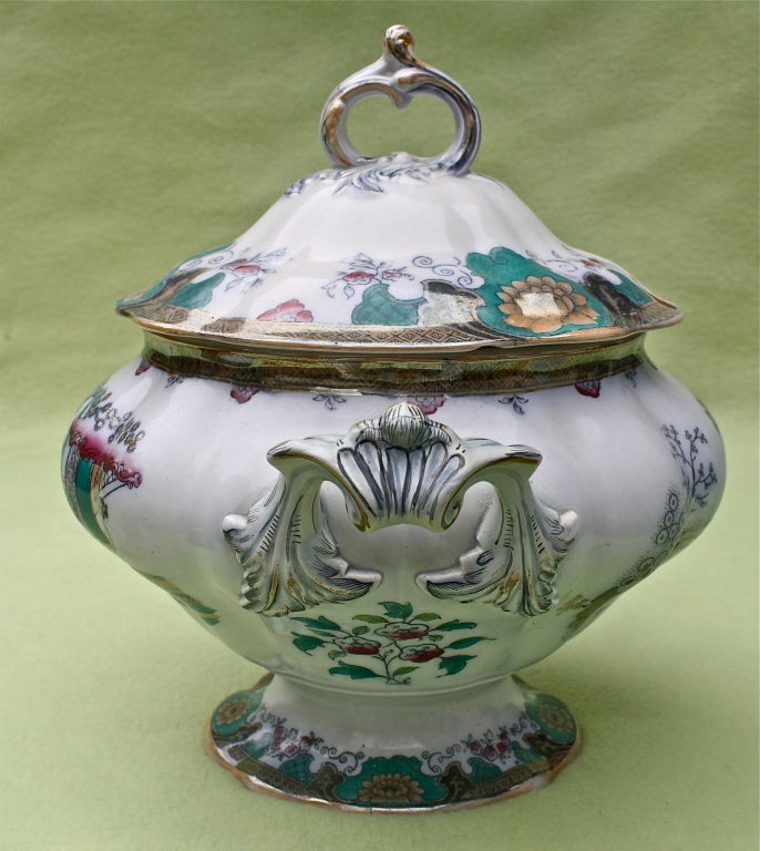 Boch Frères Kéramis was a factory founded by Victor Boch in 1841 in La Louvière in Belgium.  A ribbed melon form porcelain tureen with vividly colored Chinoiserie decoration.  An early specimen of their work.