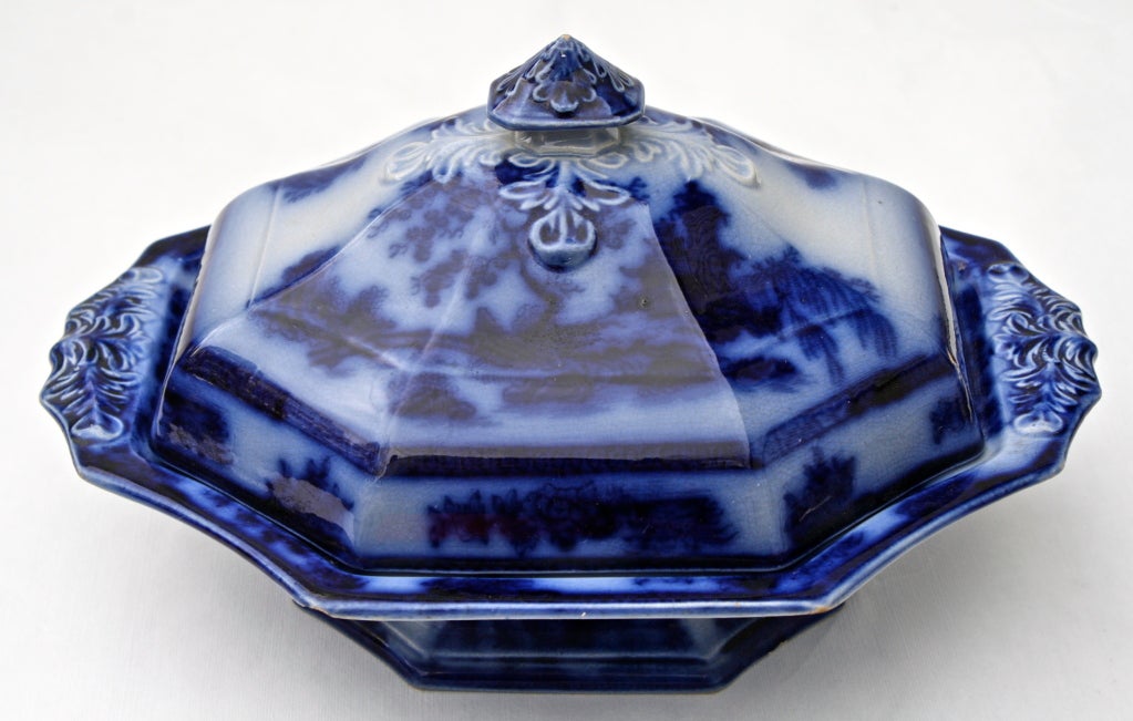 Flow blue is a style of white earthenware originating in the English Regency era c.1820, among the Staffordshire potters. The name derives from the blue glaze that blurred or "flowed" during the firing process.  This COBALT assortment