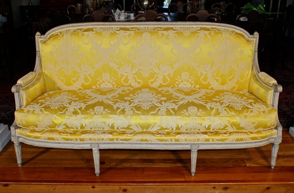 A three-seated French canapé en peinte (settee in original paint) upholstered in yellow  Scalamandre silk damask.
Jean-Baptiste Boulard, born c.1725 - died 1789, received as a Master in 1755. He  became one of the select few, with Jacob and Sene,