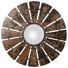 An enormous frame with sixteen petals of patinated zinc from France