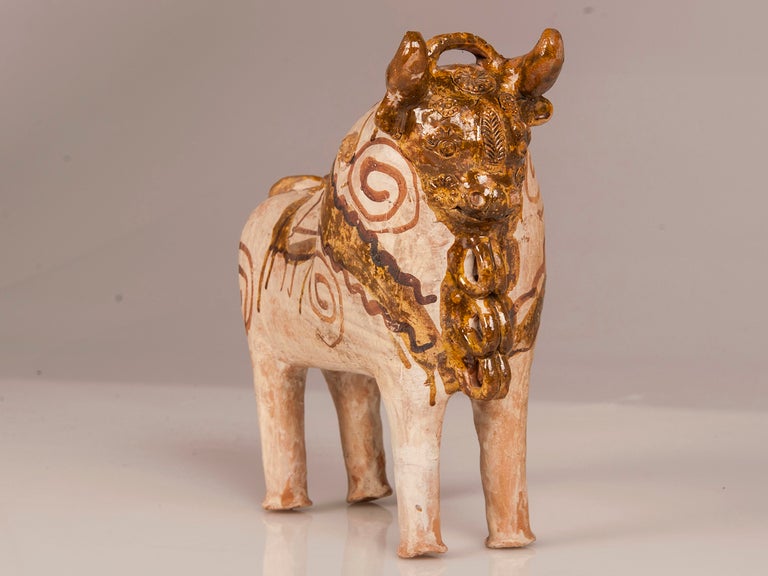 Receive our new selections direct from 1stdibs by email each week. Please click Follow Dealer below and see them first!

A large French Vallauris pottery bull in the style of Picasso with hand applied decoration circa 1930. the fantastic naive