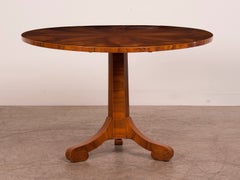 Antique An elegant Biedermeier period circular burl walnut table from Austria c.1830