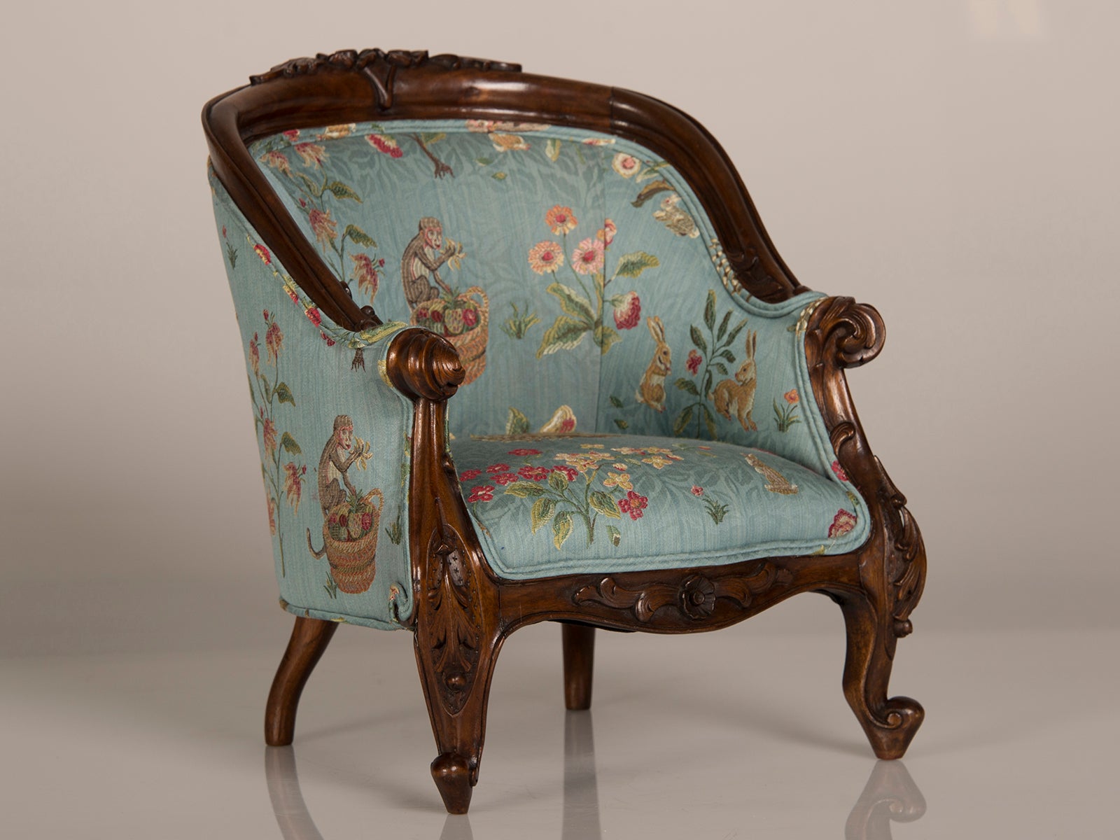 A Louis XV Style Walnut Bergere Child's Chair from France ca. 1895