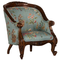 A Louis XV Style Walnut Bergere Child's Chair from France ca. 1895