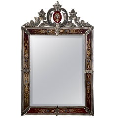 Antique A Venetian mirror with enamel decoration with a cartouche from France c. 1890.