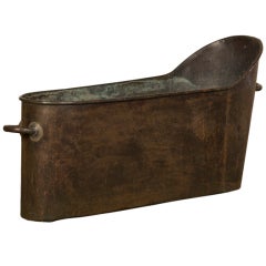 Antique An Empire period copper bath tub with a rolled rim from France c. 1815