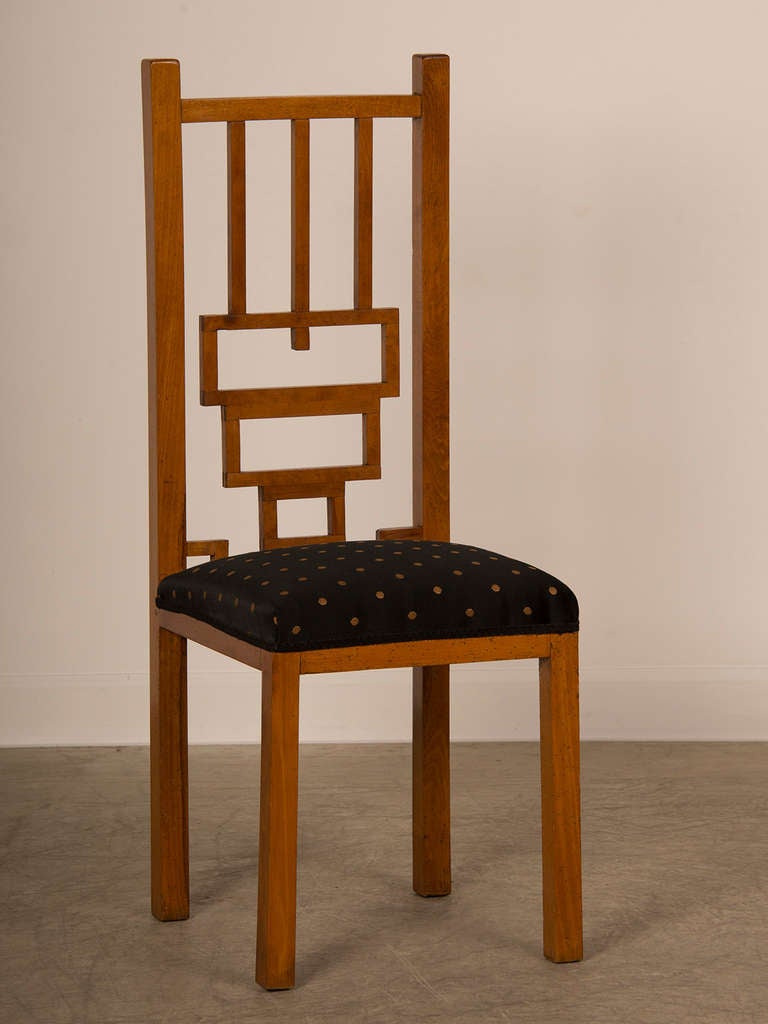 Receive our new selections direct from 1stdibs by email each week. Please click Follow Dealer below and see them first!

An unusual cherrywood side chair in the Cubism style circa 1900 having a striking geometric form with an elongated back and