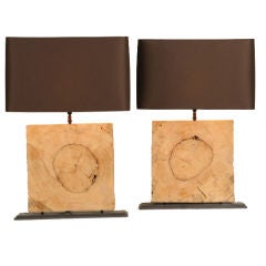 A pair of dramatic wooden block lamps from France
