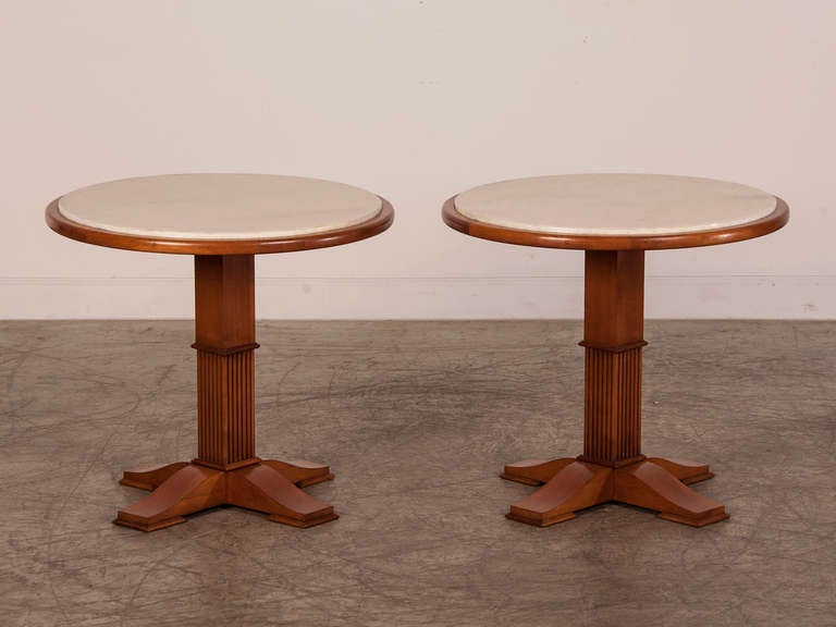 A pair of mid-century modern sycamore wood side tables from a small villa in the south of France near Aix-en-Provence c. 1950. Please notice the geometric quality of these tables with their square columns divided into an upper section with a flat