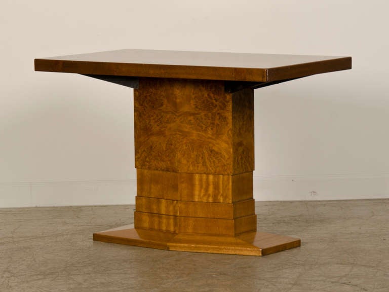 An Art Deco period burl walnut and palisander rectangular centre table from Italy c.1930. Because this table is finished on all four sides it was originally conceived as a table to be seen from all directions while still retaining its sculptural