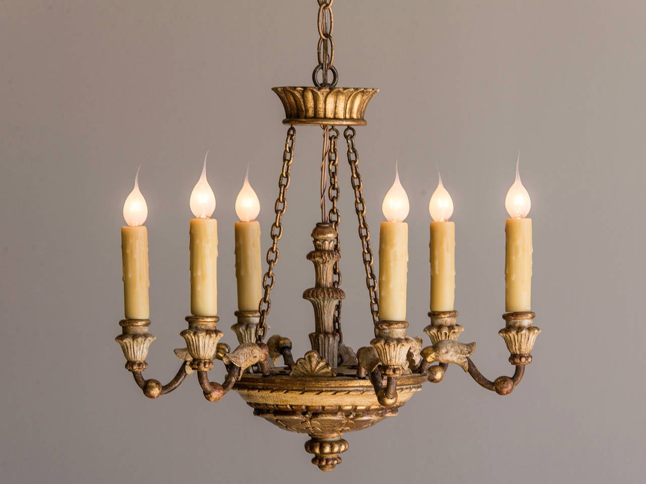 Neoclassical Painted and Gilded Vintage Six Arm Chandelier, Italy c.1920. The charming scale and detail on this fixture makes it a highly desirable addition to any interior where a diminutive light is needed. The circular platform supports the six
