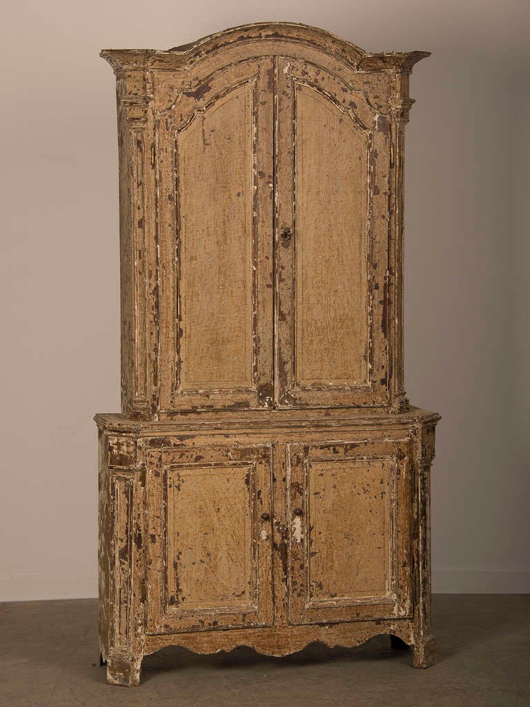 A Regence period painted buffet a deux corps from France c.1725
