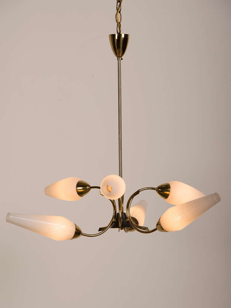 Receive our new selections direct from 1stdibs by email each week. Please click follow dealer below and see them first!

Graphic vintage six-arm brass Italian chandelier with original opaque glass shades, circa 1970. Please note that the three