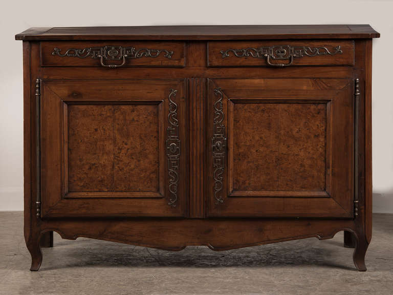 Louis XV Period Burl Walnut Buffet, Original Hardware, France c.1770. The combination of the luminous patterned burl walnut and walnut timber with the polished steel hardware gives this buffet a tremendously graphic appearance. The distinctive