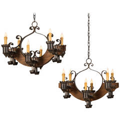 Pair of Rustic Wood and Iron Six-Light Chandeliers, France circa 1920