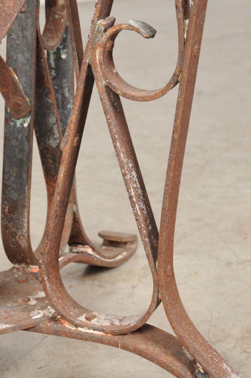 Iron base dining table with a marble top from France c. 1890 In Excellent Condition In Houston, TX
