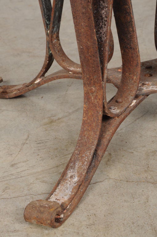19th Century Iron base dining table with a marble top from France c. 1890