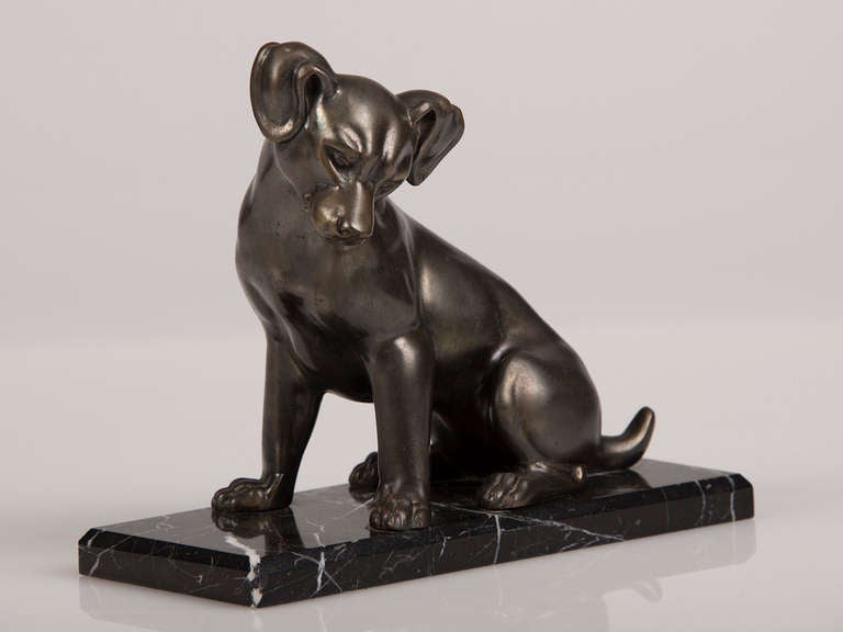 Receive our new selections direct from 1stdibs by email each week. Please click Follow Dealer below and see them first!

French Art Deco period cast metal dog on a marble base, circa 1930.