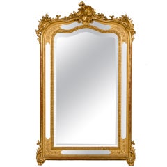Antique A superb Louis XV style gold leaf mirror with a cartouche from France c.1890