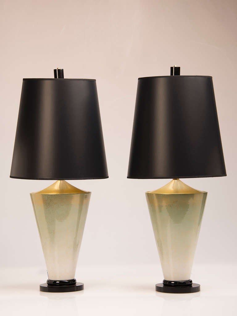 Pair Signed Mangani Gold Fleck Ceramic Vessel Lamps by , Italy, c.1970. These stylish lamps feature an inverted cone shape with a lustrous gaze created by the application of gold leaf flecks to the celadon colour. Each lamp has a circular high gloss