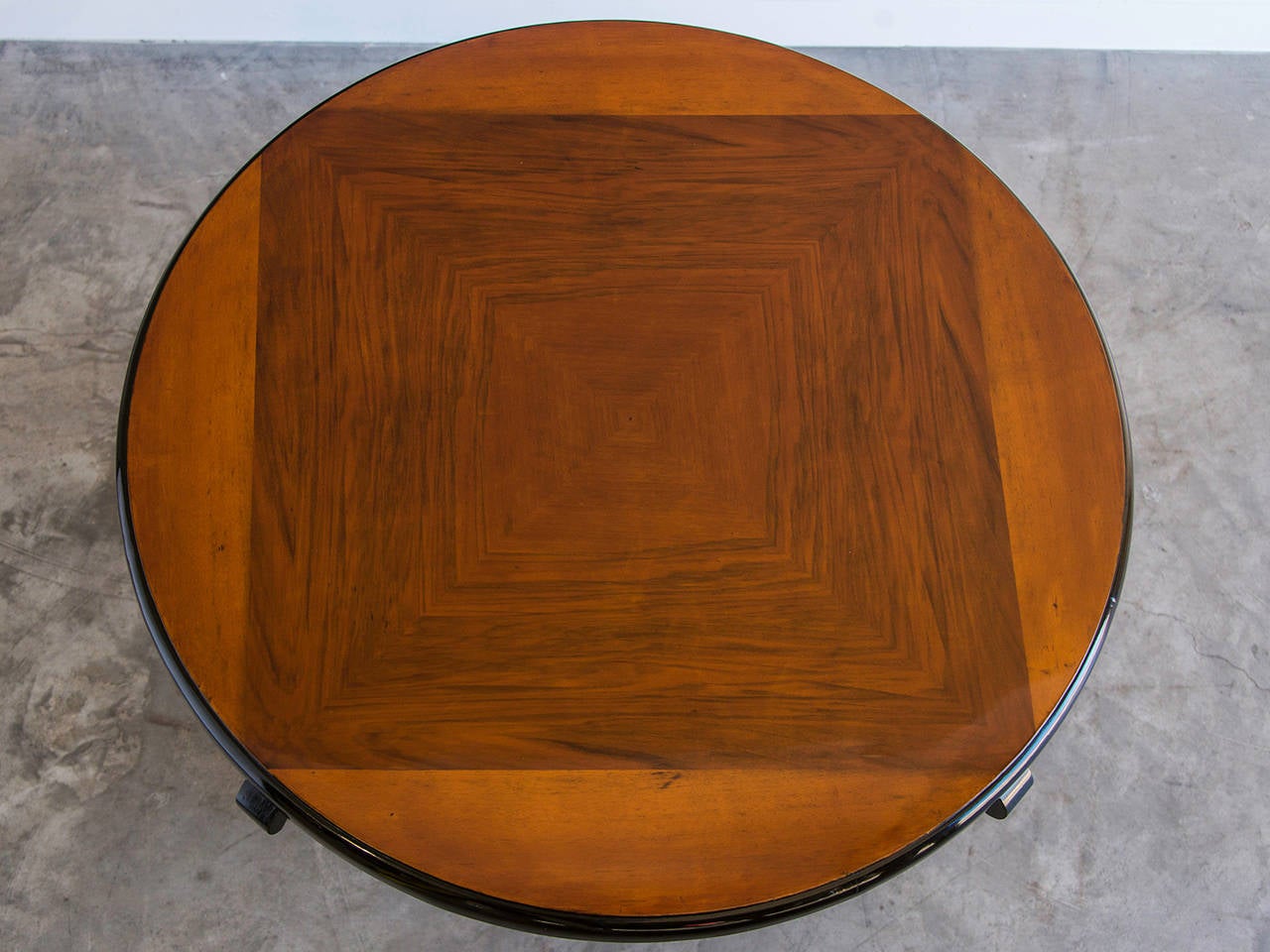 Receive our new selections direct from 1stdibs by email each week. Please click Follow Dealer below and see them first!

Vintage French Art Deco period burl walnut and ebonized timber table circa 1930. The beautiful balance of the four gently