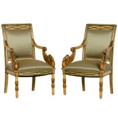 Empire period pair painted and gilded arm chairs from France c.1810