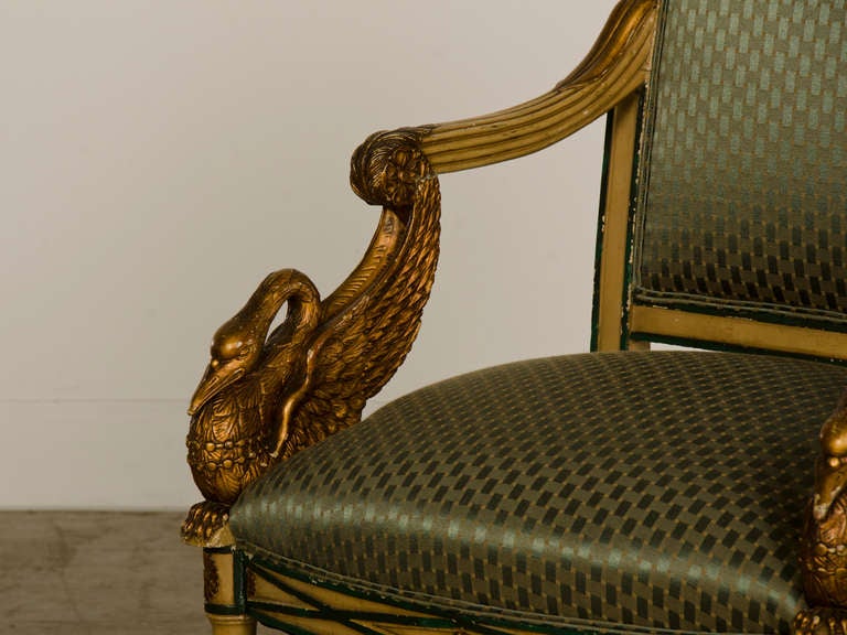 Gilt Empire period pair painted and gilded arm chairs from France c.1810