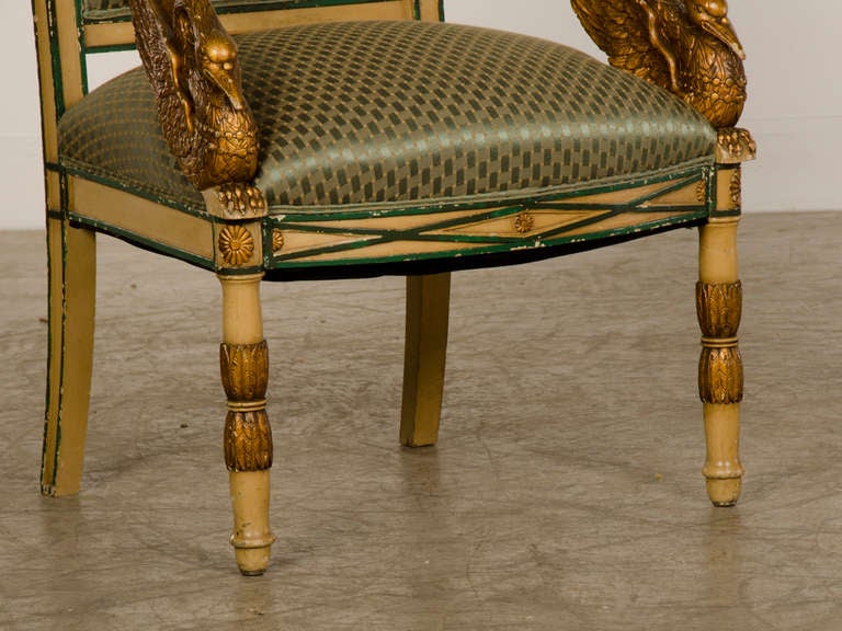 19th Century Empire period pair painted and gilded arm chairs from France c.1810