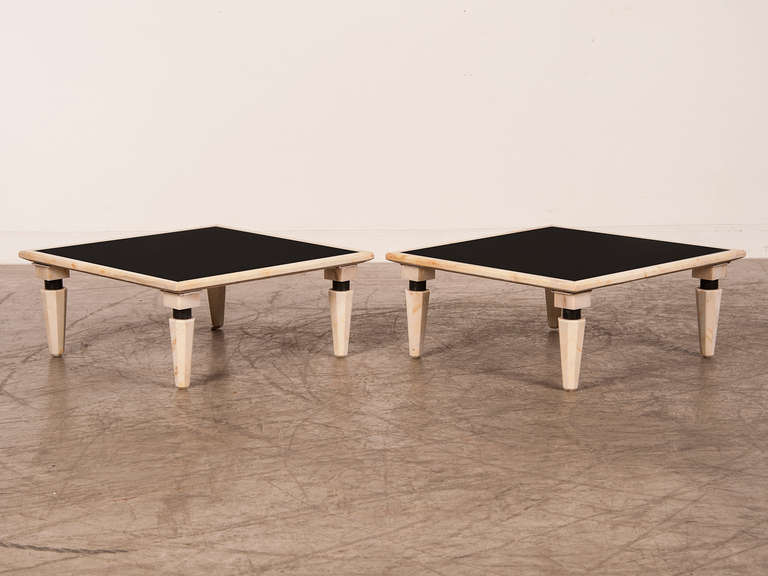 Receive our new selections direct from 1stdibs by email each week. Please click Follow Dealer below and see them first!

A pair of Italian modernist period white and black marble coffee tables circa 1960 each with tapered legs in a geometric