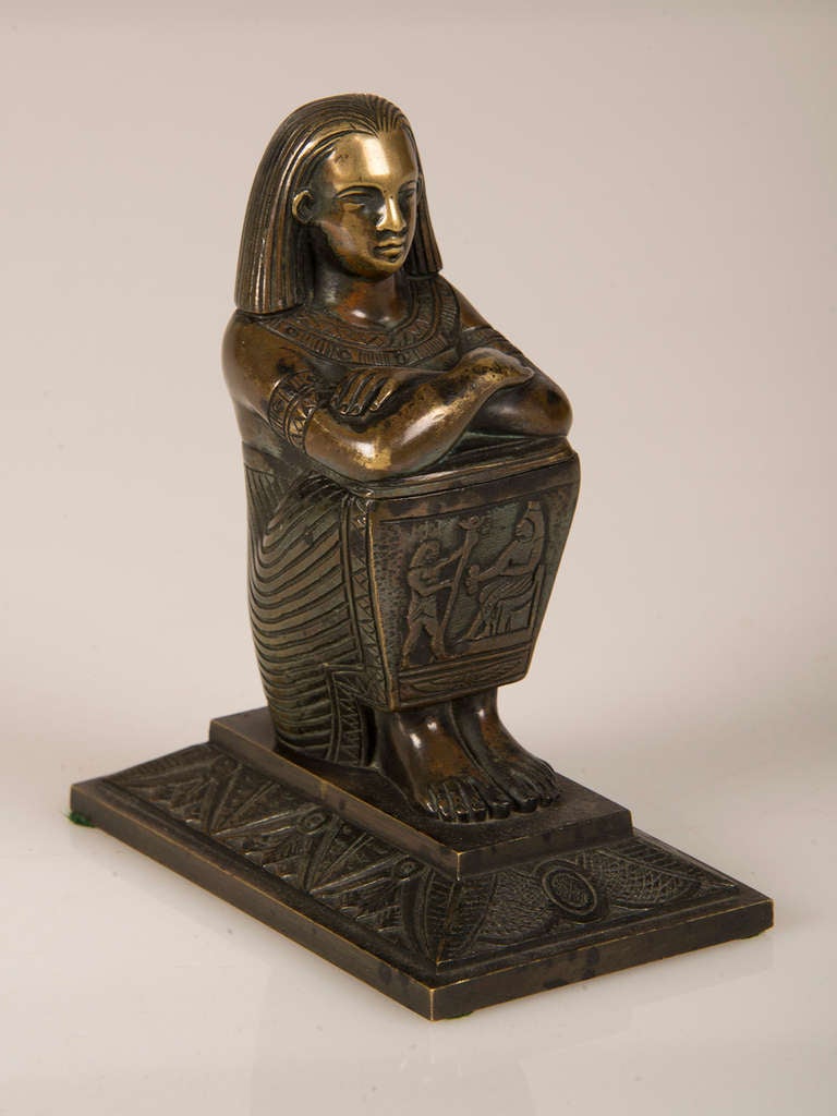 Receive our new selections direct from 1stdibs by email each week. Please click Follow Dealer below and see them first!

A wonderful French Egyptian Revival bronze ink pot circa 1880 depicting an Egyptian scribe whose upper torso folds back to
