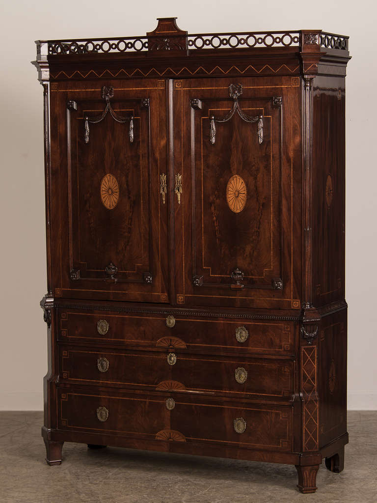 Neoclassical Dutch Mahogany Linen Press, Holland c.1790. This impressive piece showcases the best of Dutch cabinet making from the end of the eighteenth century. Not only is the mahogany timber of superb quality but the satinwood inlay as well as