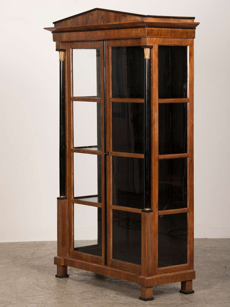 Empire style walnut vitrine having ebonized columns, Austria c.1890 2