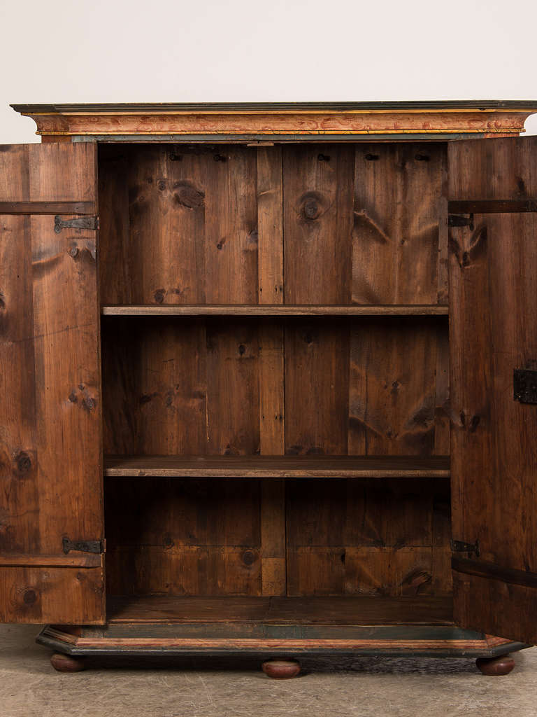 Receive our new selections direct from 1stdibs by email each week. Please click Follow Dealer below and see them first!

This handsome antique German cabinet circa 1800 was originally constructed and hand decorated for the new bride's home after
