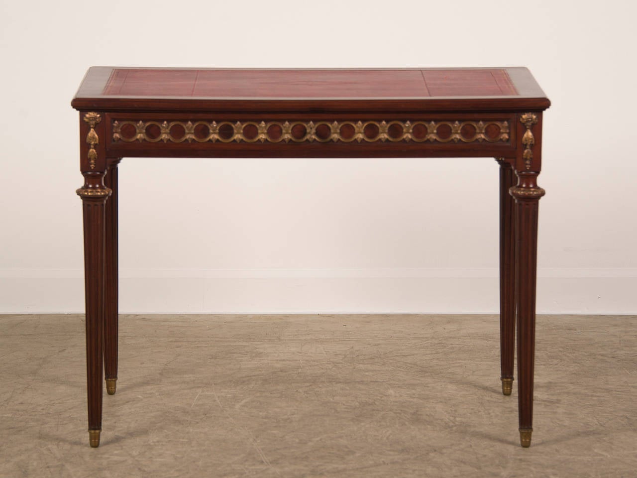 Receive our new selections direct from 1stdibs by email each week. Please click Follow Dealer below and see them first!

Louis XVI style vintage French mahogany writing table or escritoire circa 1940 having a single long drawer across the front