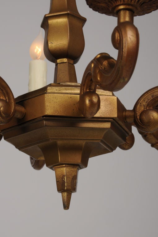 Receive our new selections direct from 1stdibs by email each week. Please click Follow Dealer below and see them first!

A handsome vintage French cast and gilded bronze chandelier circa 1940 that exemplifies the spare modern form developed during