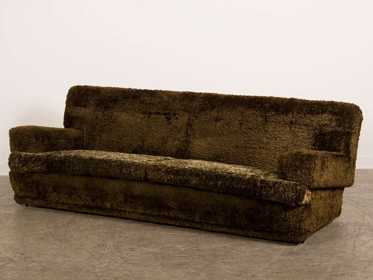 A vintage sofa from London, England c.1965 having its original upholstery from the period. This enormous sofa is an exceptionally cool artifact from a time and place that changed the world's idea of modern design. Please enlarge all of the