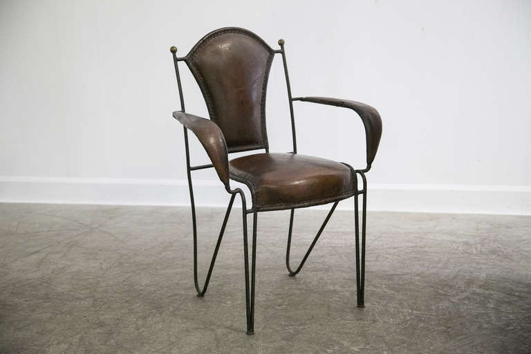 Modern Set of Four Iron, Original Leather, Arm Chairs, France, circa 1940