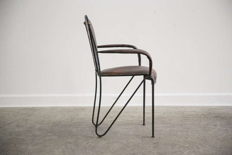 Mid-20th Century Set of Four Iron, Original Leather, Arm Chairs, France, circa 1940